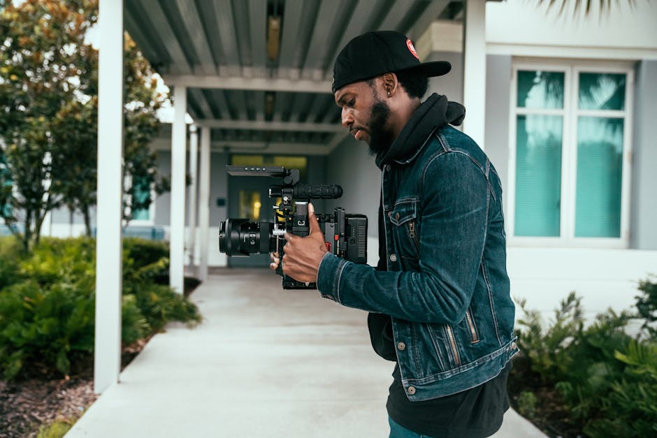 Professional wedding videographer working behind the camera